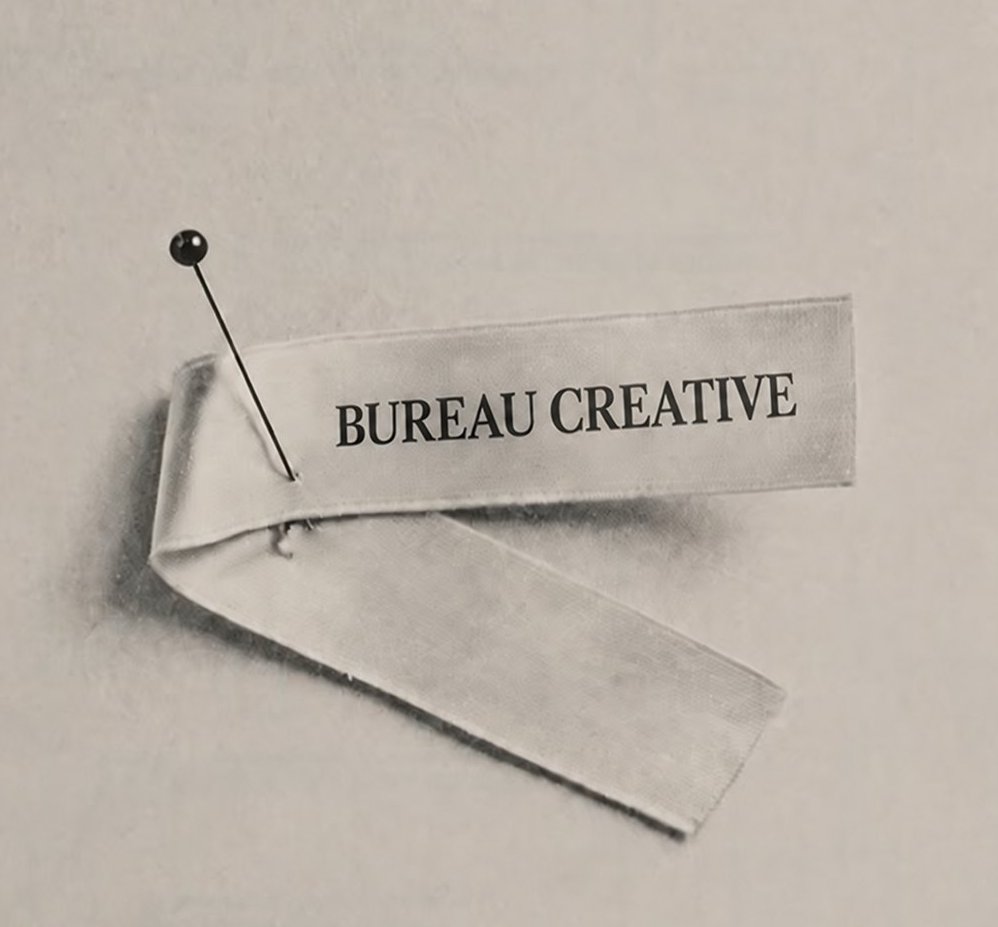 A pinned Bureau Creative fabric label